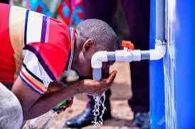 a man drinking clean water